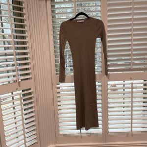 Never worn body hugging long sleeve dress.